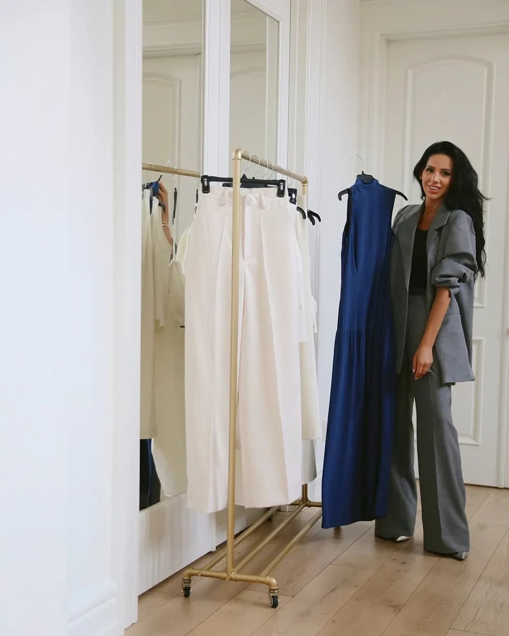 Inessa fitting a dress